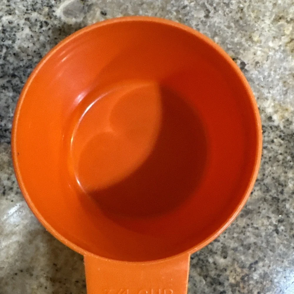 Tupperware orange cup
